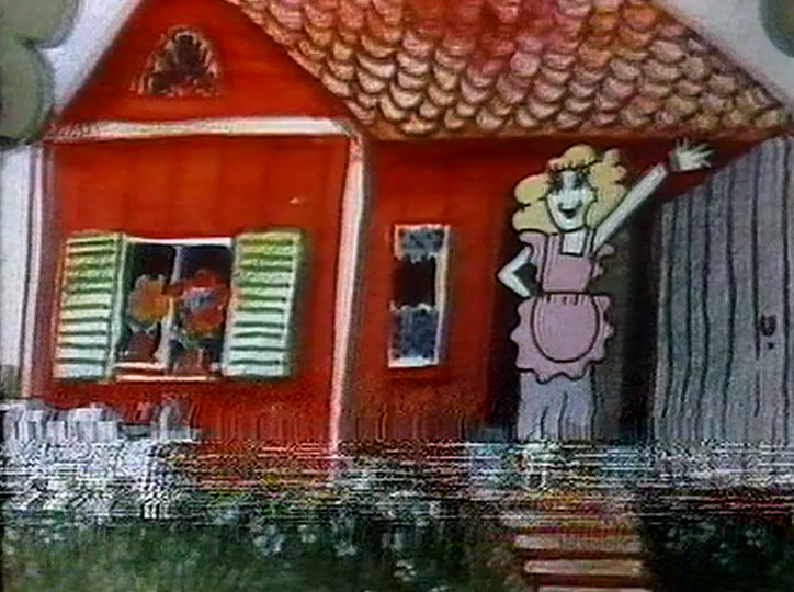 Nainen, kolmipyörällä ajava lapsi ja koira nurmikolla punaisen talon vieressä.