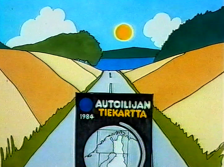 Autoilijan Tiekartta -kansi tiellä, joka katoaa mäkien väliin.