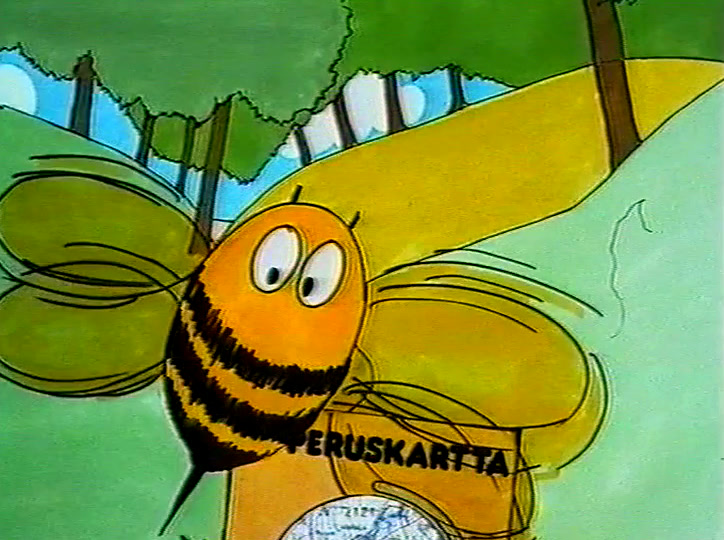 Peruskartta-kansi seisoo saniaisten ja lehtien keskellä virtaavan puron äärellä.