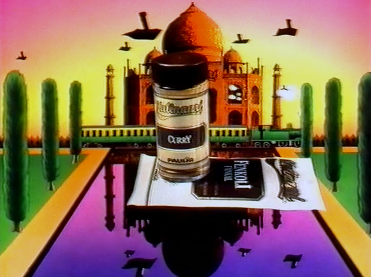Kulinaari-currypurkki seisoo jalustalla maalatun Taj Mahalin ja sen heijastuksen edessä.