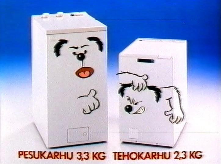 Kaksi valkoista pesukonetta sinisellä, kummallakin piirretyt sarjakuvakasvot; punainen teksti kertoo niiden täyttömäärät.